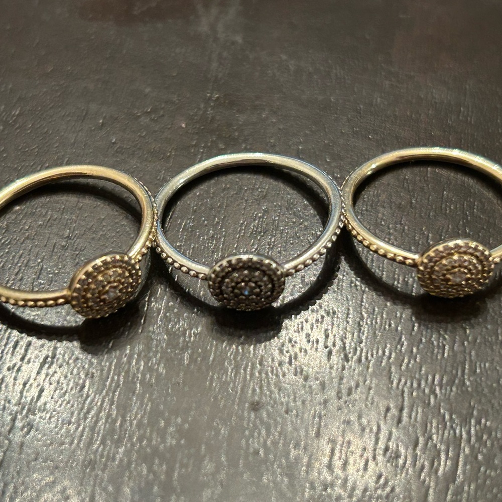 Set of thee retired Pandora rings 14k and Silver.